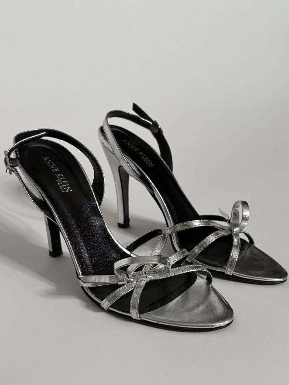 Anne Klein silver metallic stiletto slingback heels
